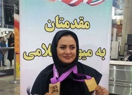 زهرا نعمتی مدال جهانی خود را به شهدای مدافع حرم و شهید حججی تقدیم کرد